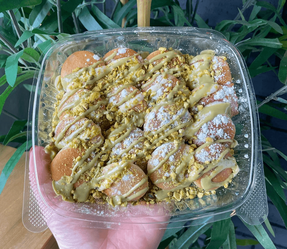 Mini pancake stack with fruit and drizzle